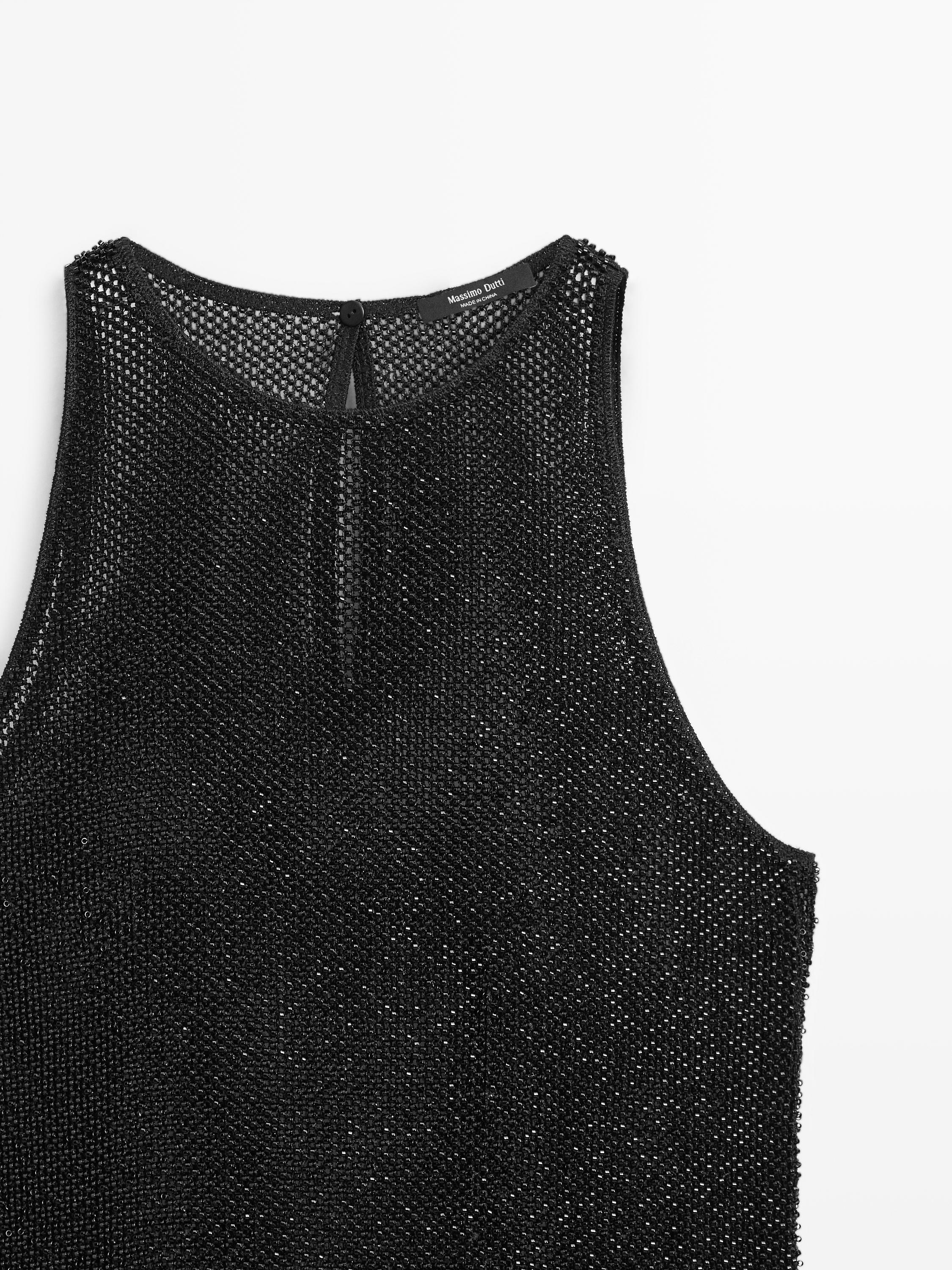 Semi-sheer top with matching beads